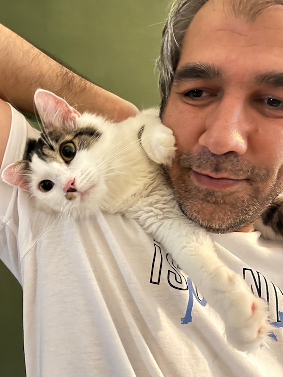 Mahdyar Ravanbakhsh with his cat